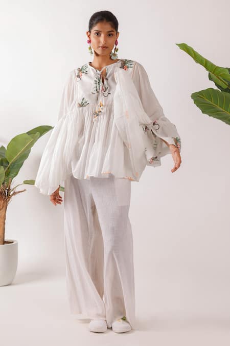 Shop_Nikasha_Ivory Cotton Embroidery Round Neck Hand Leopard Print Top_Online_at_Aza_Fashions