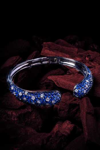 Shop Vivinia By Vidhi Mehra Silver Plated Zari Designer And Blue Zircon Bangle at Aza Fashions Shop_Vivinia By Vidhi Mehra_Silver Plated Zari Designer And Blue Zircon Bangle _at_Aza_Fashions