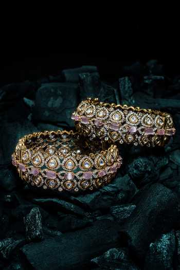 Shop Vivinia By Vidhi Mehra Gold Plated Imitation Diamonds And Pink Kundan Polki Bangles at Aza Fashions Shop_Vivinia By Vidhi Mehra_Gold Plated Imitation Diamonds And Pink Kundan Polki Bangles _at_Aza_Fashions