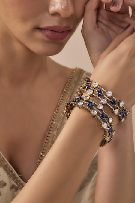 Vivinia By Vidhi Mehra Gold Plated Imitation Diamonds And Blue Kundan Polki Bangles Online at Aza Fashions Vivinia By Vidhi Mehra_Gold Plated Imitation Diamonds And Blue Kundan Polki Bangles _Online_at_Aza_Fashions