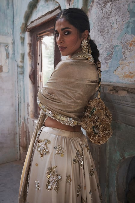 Buy Etasha By Asha Jain Ivory Silk, Tissue Sequins, Embroidery Halter Neck And Gold Lehenga Set Online at Aza Fashions Buy_Etasha By Asha Jain_Ivory Silk, Tissue Sequins, Embroidery Halter Neck And Gold Lehenga Set _Online_at_Aza_Fashions