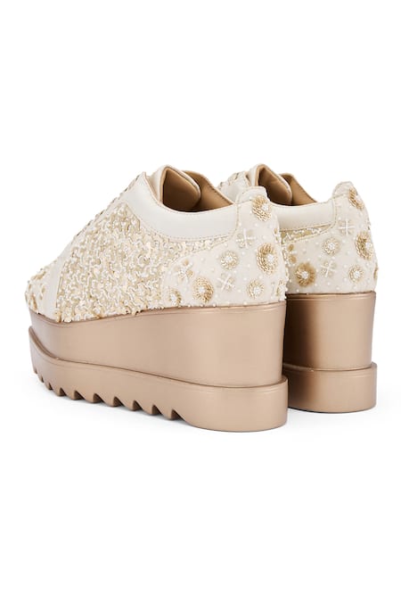 Anaar_White Buttercream Bliss Sneaker Wedges _at_Aza_Fashions