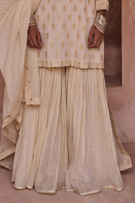 Buy Kritika Dawar Ivory Silk, Chanderi Embroidery, Metallic Thread Round Neck Zari Gharara Set Online at Aza Fashions Buy_Kritika Dawar_Ivory Silk, Chanderi Embroidery, Metallic Thread Round Neck Zari Gharara Set _Online_at_Aza_Fashions