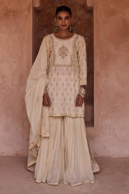 Shop Kritika Dawar Ivory Silk, Chanderi Embroidery, Metallic Thread Round Neck Zari Gharara Set Online at Aza Fashions Shop_Kritika Dawar_Ivory Silk, Chanderi Embroidery, Metallic Thread Round Neck Zari Gharara Set _Online_at_Aza_Fashions