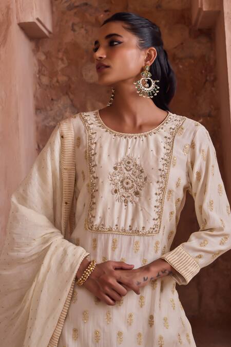 Kritika Dawar Ivory Silk, Chanderi Embroidery, Metallic Thread Round Neck Zari Gharara Set at Aza Fashions Kritika Dawar_Ivory Silk, Chanderi Embroidery, Metallic Thread Round Neck Zari Gharara Set _at_Aza_Fashions