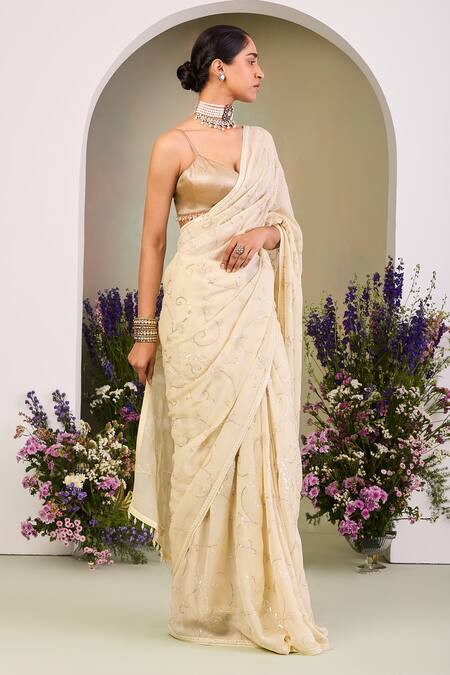 Shop Sue Mue Gold Chiffon Sequins, Zari Sweetheart Neck Light Yellow And Embroidered Saree Set Online at Aza Fashions Shop_Sue Mue_Gold Chiffon Sequins, Zari Sweetheart Neck Light Yellow And Embroidered Saree Set _Online_at_Aza_Fashions