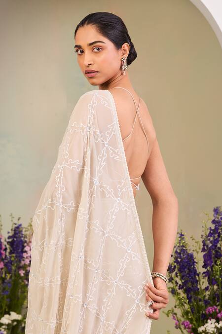 Shop_Sue Mue_Beige Georgette Pearls, Sequins, Stones Round Neck Embroidered Pure Saree Set _Online_at_Aza_Fashions
