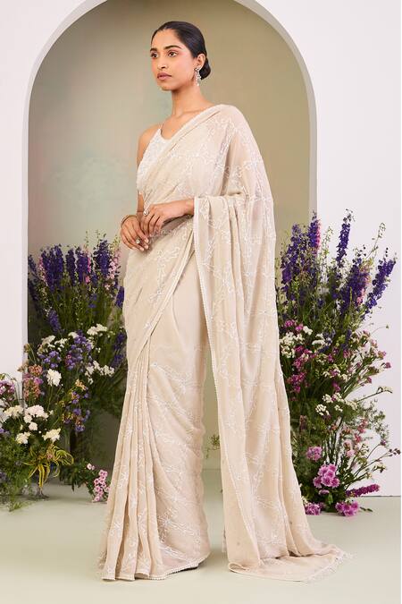 Sue Mue_Beige Georgette Pearls, Sequins, Stones Round Neck Embroidered Pure Saree Set _at_Aza_Fashions