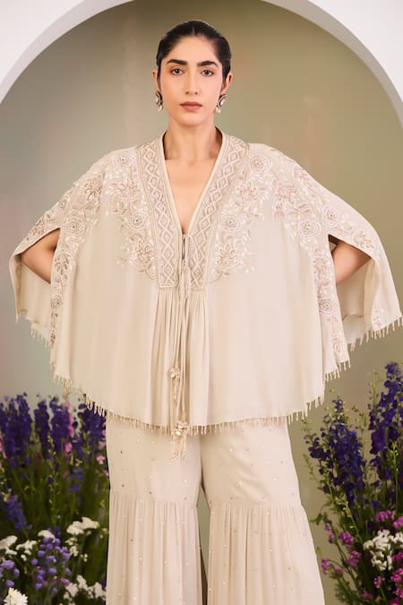 Sue Mue White Georgette Sequins, Beads V-neck Embroidered Cape Gharara Set Online at Aza Fashions Sue Mue_White Georgette Sequins, Beads V-neck Embroidered Cape Gharara Set _Online_at_Aza_Fashions