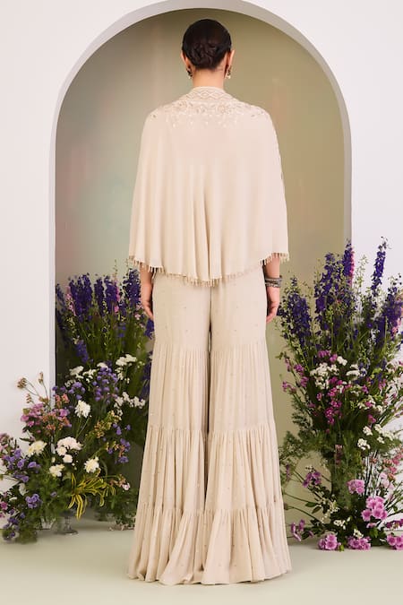 Shop Sue Mue White Georgette Sequins, Beads V-neck Embroidered Cape Gharara Set at Aza Fashions Shop_Sue Mue_White Georgette Sequins, Beads V-neck Embroidered Cape Gharara Set _at_Aza_Fashions