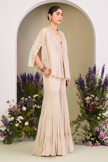 Shop Sue Mue White Georgette Sequins, Beads V-neck Embroidered Cape Gharara Set Online at Aza Fashions Shop_Sue Mue_White Georgette Sequins, Beads V-neck Embroidered Cape Gharara Set _Online_at_Aza_Fashions