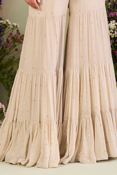 Sue Mue White Georgette Sequins, Beads V-neck Embroidered Cape Gharara Set at Aza Fashions Sue Mue_White Georgette Sequins, Beads V-neck Embroidered Cape Gharara Set _at_Aza_Fashions