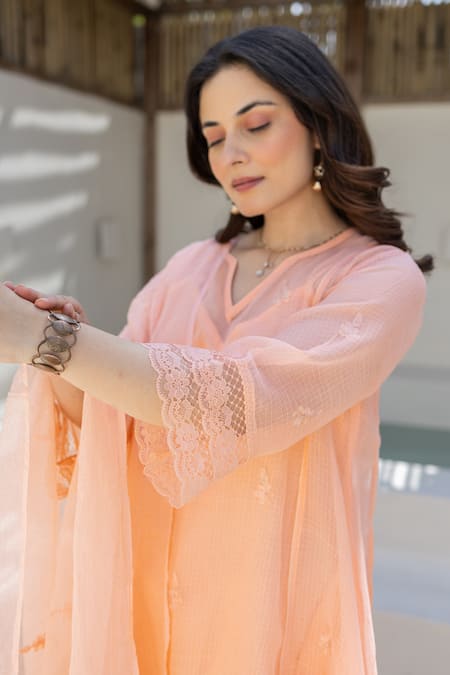 ASRUMO Peach Embroidery V-neck Doriya Kurta Set at Aza Fashions ASRUMO_Peach Embroidery V-neck Doriya Kurta Set _at_Aza_Fashions