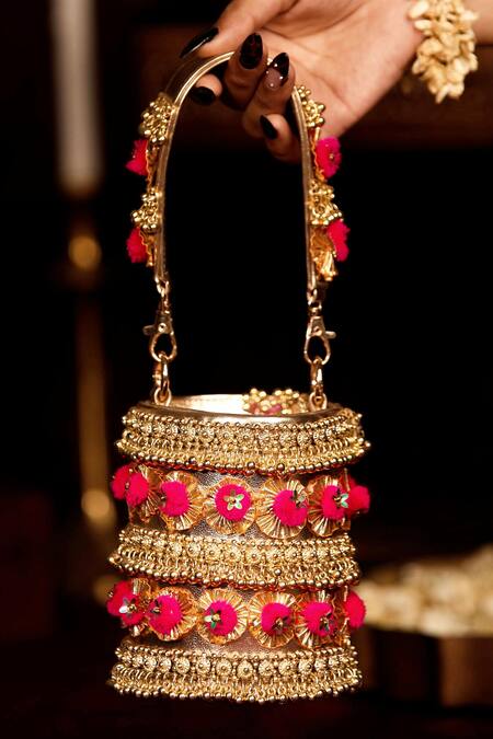 5elements Gold Zari, Tassels, Fabric Flowers Pompom Handbag at Aza Fashions 5elements_Gold Zari, Tassels, Fabric Flowers Pompom Handbag _at_Aza_Fashions