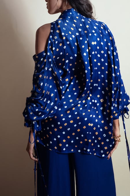 Shop Style Junkiie Blue Silk Tassels Off-shoulder Bandhini Print Shirt at Aza Fashions Shop_Style Junkiie_Blue Silk Tassels Off-shoulder Bandhini Print Shirt _at_Aza_Fashions