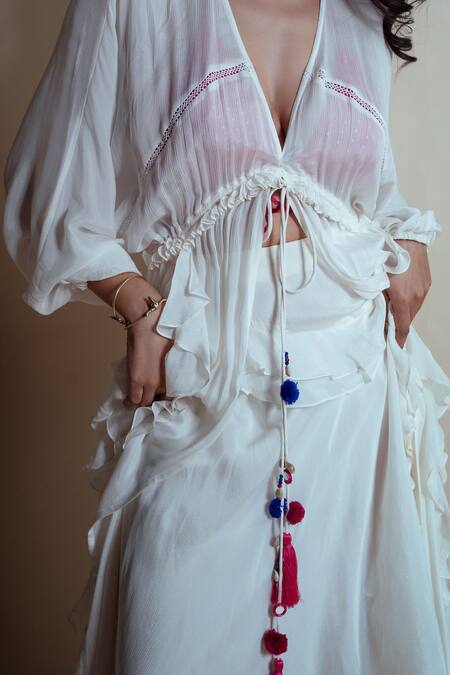 Style Junkiie Ivory Chiffon, Chinon Tassels V-neck Vanilla Cascade Ruffle Duster Online at Aza Fashions Style Junkiie_Ivory Chiffon, Chinon Tassels V-neck Vanilla Cascade Ruffle Duster _Online_at_Aza_Fashions