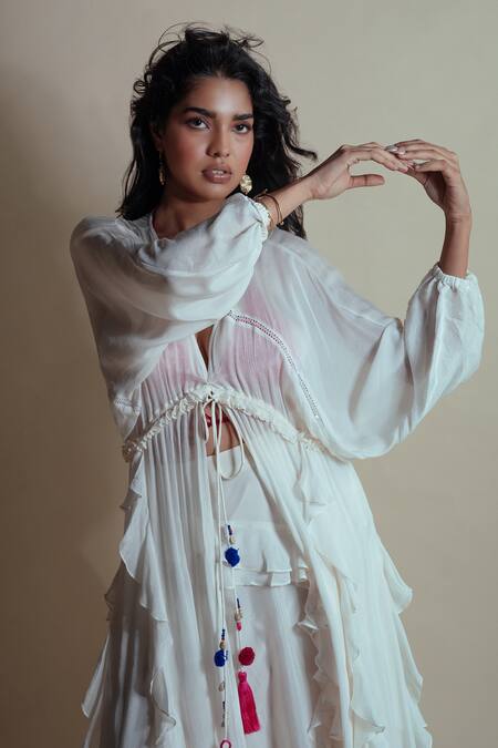 Style Junkiie Ivory Chiffon, Chinon Tassels V-neck Vanilla Cascade Ruffle Duster at Aza Fashions Style Junkiie_Ivory Chiffon, Chinon Tassels V-neck Vanilla Cascade Ruffle Duster _at_Aza_Fashions