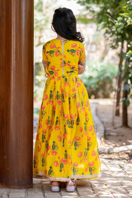 Shop_Yuvraani Jaipur_Yellow Chanderi, Cotton, Net Embroidery Printed Lehenga Set For Girls _at_Aza_Fashions