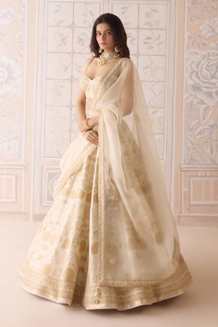 Shyam Narayan Prasad Ivory Silk, Organza Embroidery, Zari, Applique Sweetheart Neck Lehenga Set Online at Aza Fashions Shyam Narayan Prasad_Ivory Silk, Organza Embroidery, Zari, Applique Sweetheart Neck Lehenga Set _Online_at_Aza_Fashions