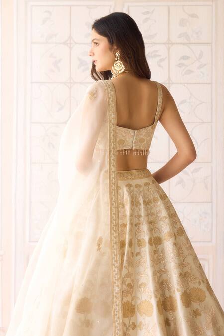 Buy Shyam Narayan Prasad Ivory Silk, Organza Embroidery, Zari, Applique Sweetheart Neck Lehenga Set Online at Aza Fashions Buy_Shyam Narayan Prasad_Ivory Silk, Organza Embroidery, Zari, Applique Sweetheart Neck Lehenga Set _Online_at_Aza_Fashions