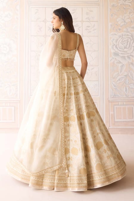 Shop Shyam Narayan Prasad Ivory Silk, Organza Embroidery, Zari, Applique Sweetheart Neck Lehenga Set at Aza Fashions Shop_Shyam Narayan Prasad_Ivory Silk, Organza Embroidery, Zari, Applique Sweetheart Neck Lehenga Set _at_Aza_Fashions
