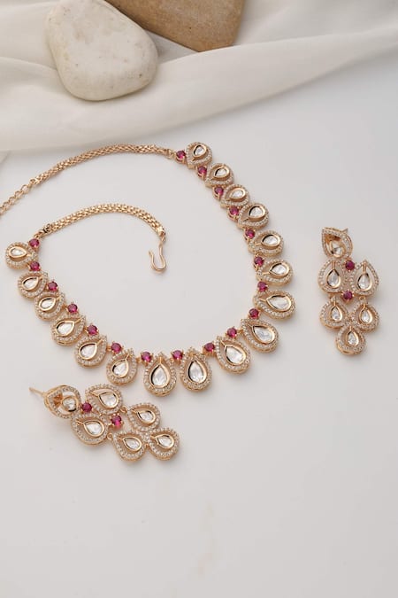 Shop Swabhimann Red Stones Rose Gold Polki Necklace Set at Aza Fashions Shop_Swabhimann_Red Stones Rose Gold Polki Necklace Set _at_Aza_Fashions