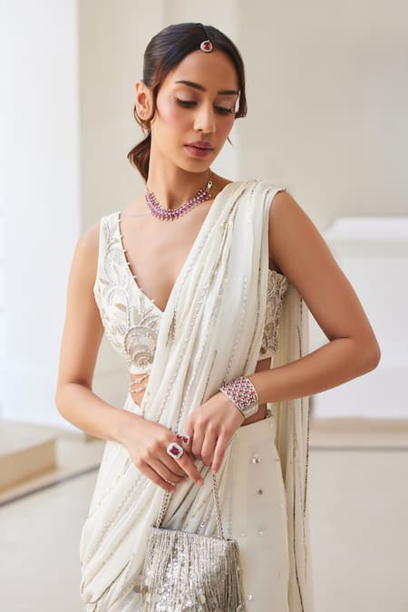 Label Sanya Gulati_White Georgette Zari, Pearls, Sequins V-neck Designer Pre-draped Saree And Blouse _at_Aza_Fashions