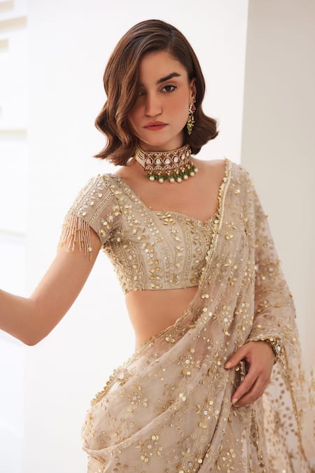 Label Sanya Gulati_Ivory Silk, Tissue Sequins, Mirrors, Cut Work Gold Pre-draped Saree Set _at_Aza_Fashions