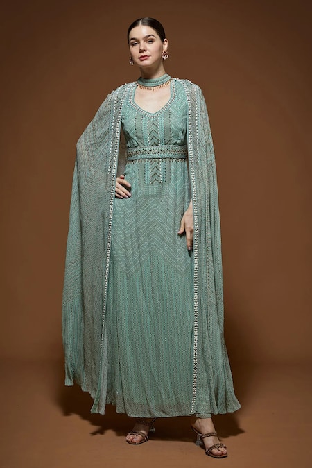 NIRRAAMYAA Aqua Viscose, Georgette Rhinestones V-neck Blue Embellished Gown 