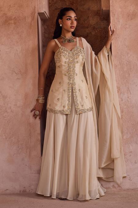 Kritika Dawar Ivory Silk, Organza Pearls Sweetheart Neck Embroidered Sharara Set at Aza Fashions Kritika Dawar_Ivory Silk, Organza Pearls Sweetheart Neck Embroidered Sharara Set _at_Aza_Fashions