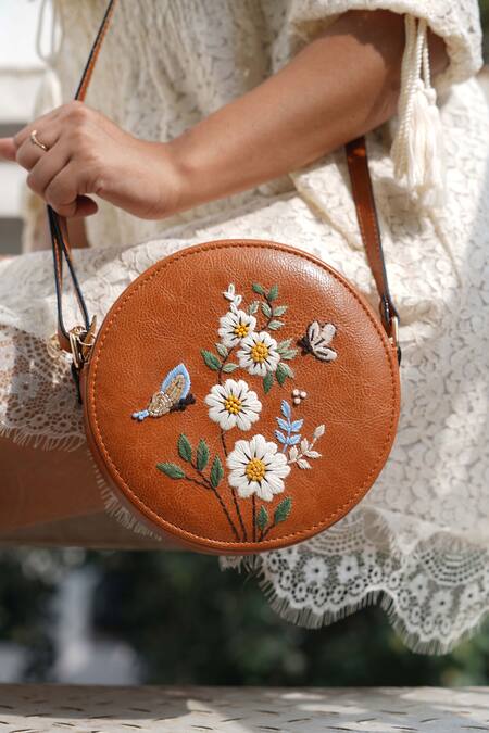 Shop_Miri_Tan Embroidery Hand Daisy Sling Bag _Online_at_Aza_Fashions