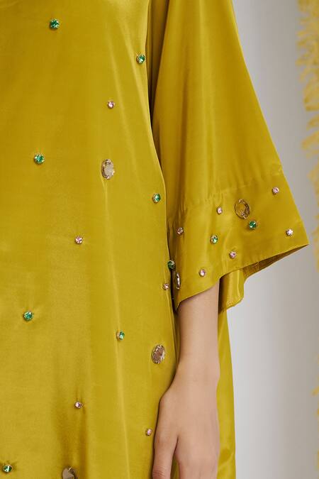 Siyona By Ankurita_Mustard Viscose, Crepe Stones, Sequins V-neck Sarson Softy Farshi Set _Online_at_Aza_Fashions