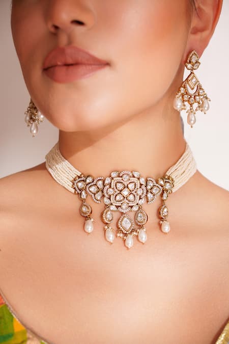 Zevar By Geeta Gold Plated Pearls, Stones Kundan Polki Designer Necklace And Earrings Set Online at Aza Fashions Zevar By Geeta_Gold Plated Pearls, Stones Kundan Polki Designer Necklace And Earrings Set _Online_at_Aza_Fashions