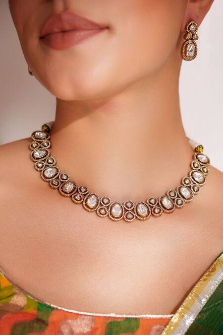 Zevar By Geeta Gold Plated Zari Finish Zircon Necklace And Earring Set Online at Aza Fashions Zevar By Geeta_Gold Plated Zari Finish Zircon Necklace And Earring Set _Online_at_Aza_Fashions