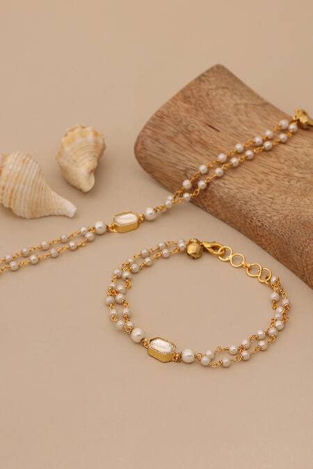 Ruby Raang_Gold Plated Pearls, Stones, Beads Polki Kundan Anklets _at_Aza_Fashions