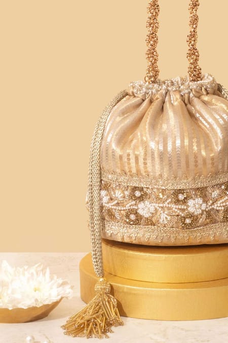 Buy Amyra Gold Embroidery, Tassels Taj Bucket Bag Online at Aza Fashions Buy_Amyra_Gold Embroidery, Tassels Taj Bucket Bag _Online_at_Aza_Fashions
