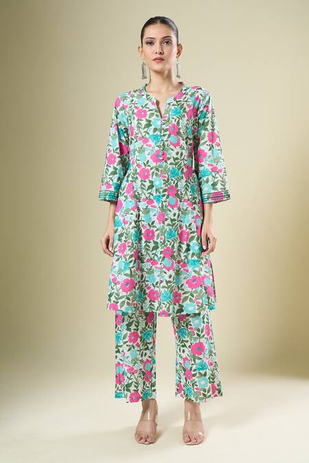 Samyukta Singhania Pink Cotton Split V-neck Floral Print Kurta And Pant Set at Aza Fashions Samyukta Singhania_Pink Cotton Split V-neck Floral Print Kurta And Pant Set_at_Aza_Fashions