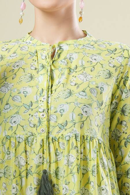 Buy Samyukta Singhania Yellow Cotton Tassels Round Neck Floral Print Designer Dress Online at Aza Fashions Buy_Samyukta Singhania_Yellow Cotton Tassels Round Neck Floral Print Designer Dress_Online_at_Aza_Fashions