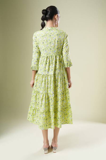 Shop Samyukta Singhania Yellow Cotton Tassels Round Neck Floral Print Designer Dress at Aza Fashions Shop_Samyukta Singhania_Yellow Cotton Tassels Round Neck Floral Print Designer Dress_at_Aza_Fashions