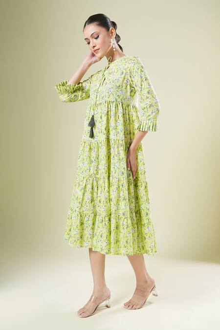 Shop Samyukta Singhania Yellow Cotton Tassels Round Neck Floral Print Designer Dress Online at Aza Fashions Shop_Samyukta Singhania_Yellow Cotton Tassels Round Neck Floral Print Designer Dress_Online_at_Aza_Fashions