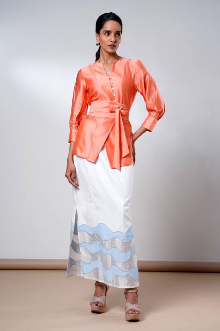 Madder Much Orange Cotton Embroidery Round Neck Tangerine Wrap Top And Skirt Set at Aza Fashions Madder Much_Orange Cotton Embroidery Round Neck Tangerine Wrap Top And Skirt Set _at_Aza_Fashions