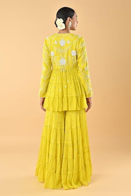 Shop Keith Gomes Yellow Chiffon, Crepe Sequins, Embroidery V-neck Peplum Kurta And Gharara Set at Aza Fashions Shop_Keith Gomes_Yellow Chiffon, Crepe Sequins, Embroidery V-neck Peplum Kurta And Gharara Set _at_Aza_Fashions