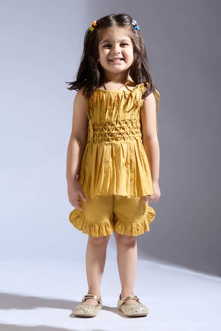 Neha Gursahani Mustard Cotton Ruffles Cambric Top And Shorts Set Online at Aza Fashions Neha Gursahani_Mustard Cotton Ruffles Cambric Top And Shorts Set _Online_at_Aza_Fashions