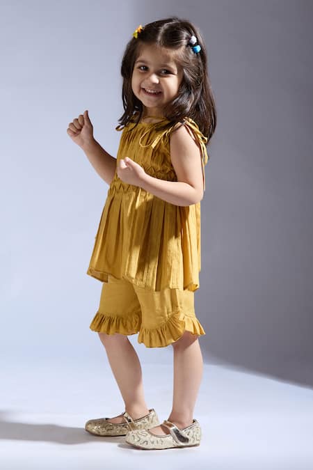 Buy Neha Gursahani Mustard Cotton Ruffles Cambric Top And Shorts Set Online at Aza Fashions Buy_Neha Gursahani_Mustard Cotton Ruffles Cambric Top And Shorts Set _Online_at_Aza_Fashions