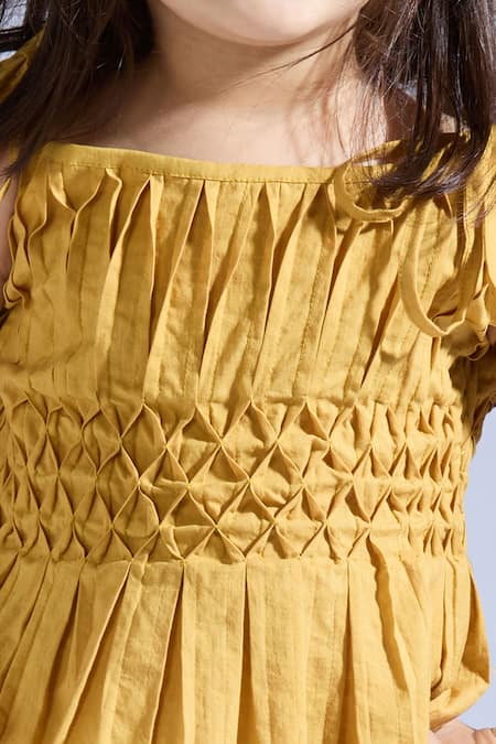 Shop Neha Gursahani Mustard Cotton Ruffles Cambric Top And Shorts Set Online at Aza Fashions Shop_Neha Gursahani_Mustard Cotton Ruffles Cambric Top And Shorts Set _Online_at_Aza_Fashions