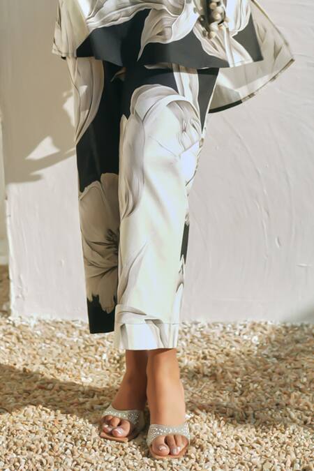 Rainas Black Cotton, Linen Pom-poms, Tassels Round Neck Floral Print Earthen Petals Set Online at Aza Fashions Rainas_Black Cotton, Linen Pom-poms, Tassels Round Neck Floral Print Earthen Petals Set _Online_at_Aza_Fashions