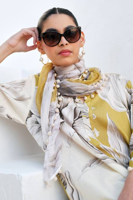 Buy Rainas Mustard Cotton, Linen Pom-poms Round Neck Bloom Kurta Pant Set Buy_Rainas_Mustard Cotton, Linen Pom-poms Round Neck Bloom Kurta Pant Set