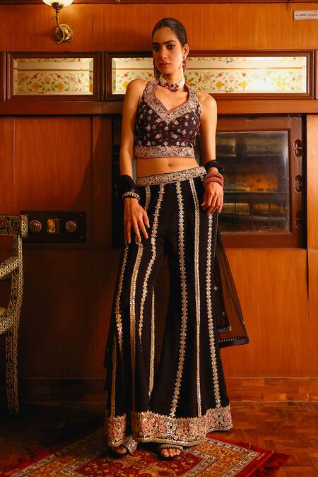 Shop Sabe Black Georgette, Net Embroidery Halter Neck Designer Falguni Sharara Set Online at Aza Fashions Shop_Sabe_Black Georgette, Net Embroidery Halter Neck Designer Falguni Sharara Set _Online_at_Aza_Fashions