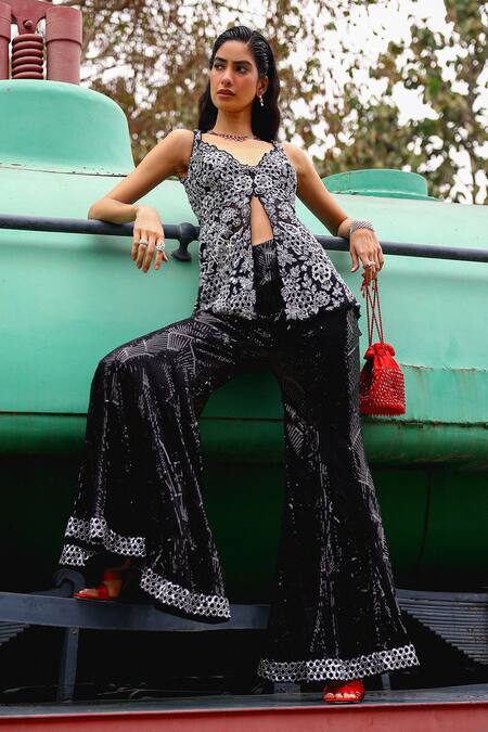 Sabe_Black Net Embroidery V-neck Designer Peplum Top And Bell Bottom Pant _at_Aza_Fashions