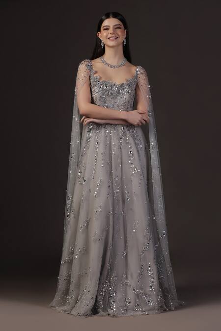 Pooja Peshoria_Silver Net, Crepe, Viscose Sequins Round Neck Hand Embroidered Cape Gown _at_Aza_Fashions